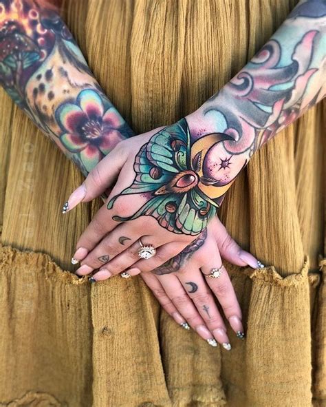 colored hand tattoos|detailed hand tattoos.